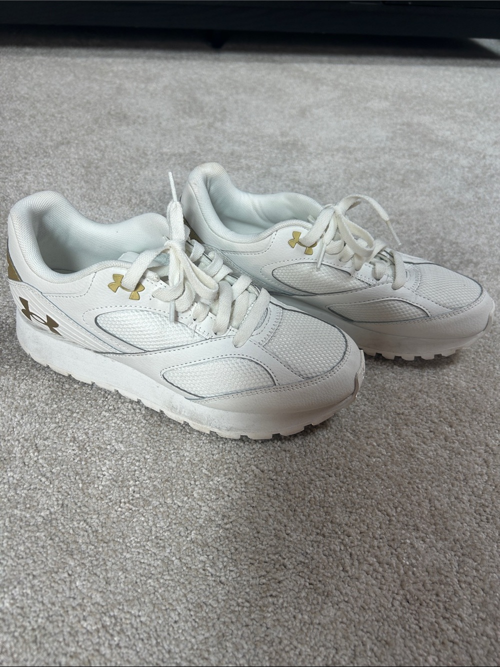 Under Armour Women's White Sneakers with Gold Logo Accents